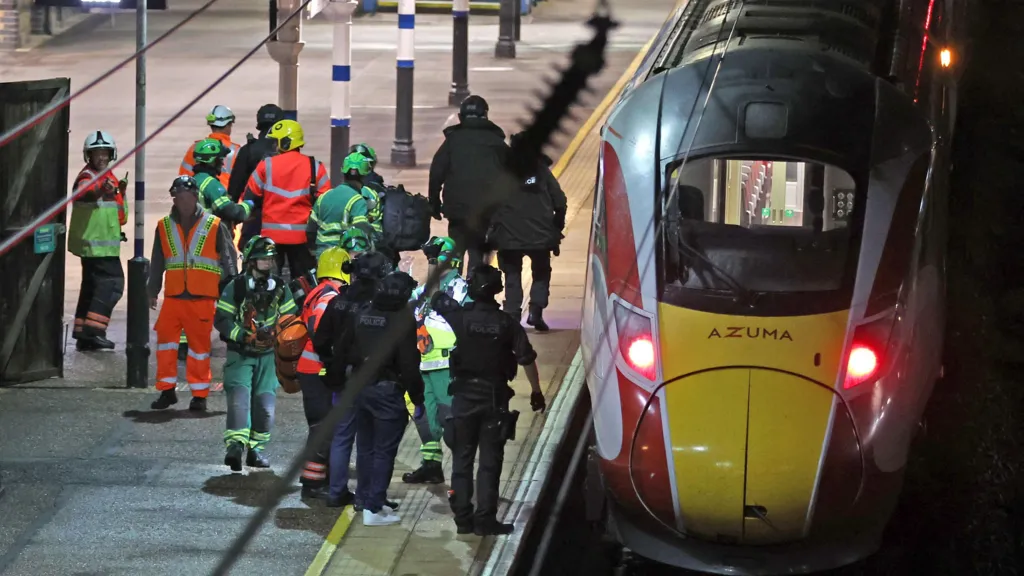 One suspect in train stabbings as rail worker critical condition